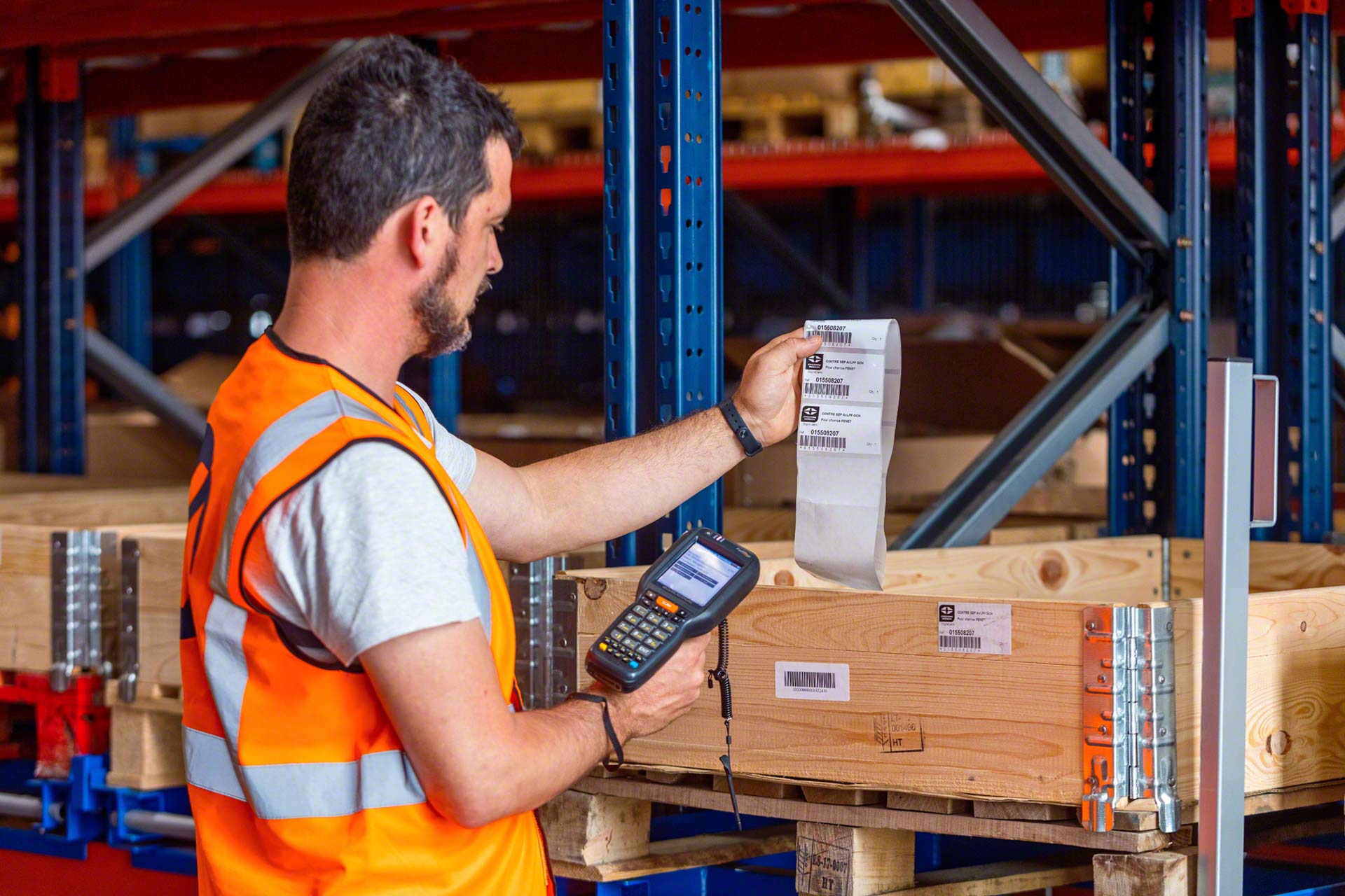Warehouse manager counting boxes on shelves with a clipboard